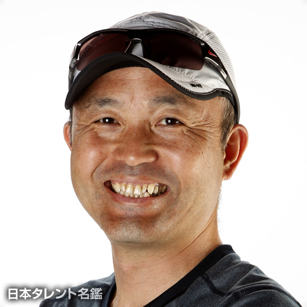 金　哲彦